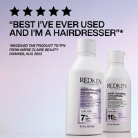 Redken Acidic Bonding Concentrate Shampoo in Clear