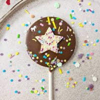 Slabb Milk Chocolate Sprinkle Star Lollipop listed by Real Food Hub