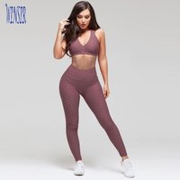 Wholesales sexy women yoga gym active wear custom blank bubble textured polyester spandex pink crane sports bra and legging set