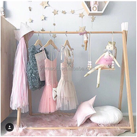 Wholesales Baby Bedroom Movable Wooden Clothes Hanger Stand Kids Clothing Floor Display Hanger