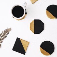 Creative black gold ceramic gold-plated coaster Nordic wind insulation pad tea coaster set gold irregular shaped pad