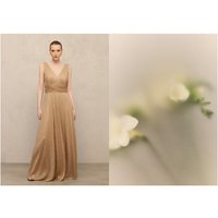 Woman Fiesta El Corte Inglés - Vestido largo de punto con cuello pico.