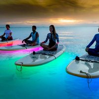 Night SUP Yoga in Honolulu, Hawaii
