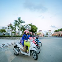 Da Nang Night Motorbike Tour & River Cruise Riding By Lady Rider