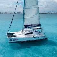 Luxury Catamaran tour to Isla Mujeres with transportation from Playa del Carmen