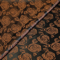 Doublure satin jacquard - Fleuri orangé fond noir