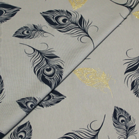 Molleton non gratté (French terry) - Plume bleu & doré fond gris