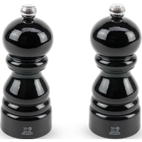 Elegant and refined, this beautiful black gloss set of salt and pepper mills will impress everyone at the table. At a small but mighty 12cm, these salt and pepper mills have been crafted from beautiful beechwood and are both adorned with a brilliant button that has been designed to easily regulate the texture of the grind. Salt mill suitable for use with dry rock salt only. Paris