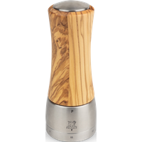 With its olive wood design, the Madras manual pepper mill is as beautiful as it is functional. Its smooth body reveals the inimitable grain of the olive wood, while its stainless steel base houses a unique pepper grind adjustment mechanism. Madras
