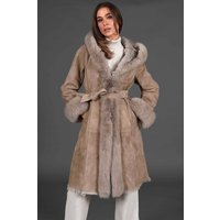 Manteau en mouton suedé beige à capuce avec bordure en fourrure de renard