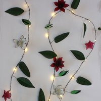 Click to view product details and reviews for Clematis Metal Floral Fairy Lights. Click to view product details and reviews for Clematis Metal Floral Fairy Lights.