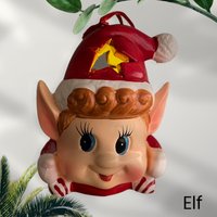 Click to view product details and reviews for Elf Light Up Bauble Decoration. Click to view product details and reviews for Elf Light Up Bauble Decoration.