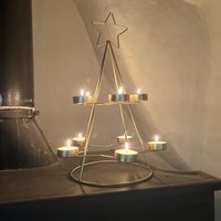 Click to view product details and reviews for Gold Star Christmas Tree Tealight Candle Holder 35cm. Click to view product details and reviews for Gold Star Christmas Tree Tealight Candle Holder 35cm.