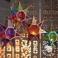 Click to view product details and reviews for Moroccan Style Star Glass Lantern. Click to view product details and reviews for Moroccan Style Star Glass Lantern.
