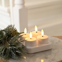 Click to view product details and reviews for Rechargeable Tealight Candles In Charging Base 4 Pack. Click to view product details and reviews for Rechargeable Tealight Candles In Charging Base 4 Pack.