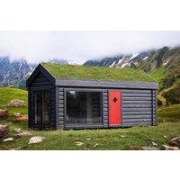 Tiny House Fertighaus “HyggeHut” | Winterfestes Blockhaus 8x3m mit Schlafboden Tiny House Fertighaus “HyggeHut” | Winterfestes Blockhaus 8x3m mit Schlafboden