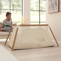 Kiddies Kingdom 30% Discount on Tutti Bambini CoZee Go 3in1 Travel Cot Playpen Scandinavian WalnutEcru