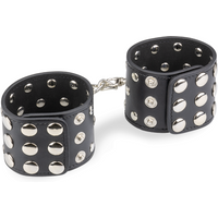 Menottes poignets cuir noir rivets