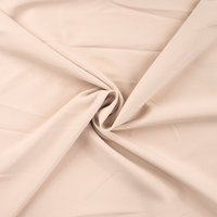 Tissu polyester bi stretch uni beige - Mondial Tissus