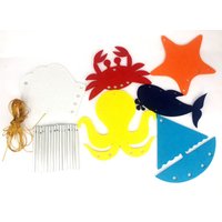 Kit carillon avec décoration en feutrine 12 pièces - Mondial Tissus