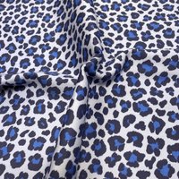 Tissu sergé coton bleu ciel grand léopard marine - Mondial Tissus