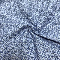 Tissu voile de coton doux bleumoyen mini pâquerettes denses - Mondial Tissus
