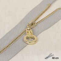Fermeture à glissière unie grise clair zip rond doré 40cm - Mondial Tissus
