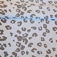 Tissu jacquard motif léopard écru - Mondial Tissus