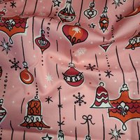 Tissu satin de coton boules de noël rouges sur fond rose - Mondial Tissus