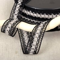 Ruban entre deux croisillons bicolore noir blanc 20mm - Mondial Tissus