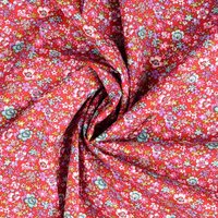 Tissu popeline de coton fleuri sur fond rouge - Mondial Tissus