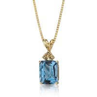 Swiss Blue Topaz and Diamond Flourish Pendant Necklace in 9ct Gold