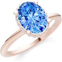 Swiss Blue Topaz and Diamond Oval Hidden Double Halo Ring in 9ct Rose Gold