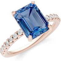 London Blue Topaz and Diamond Solitaire with Accent Ring in 9ct Rose Gold