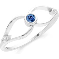 London Blue Topaz and Diamond Bezel Twist Crossover Ring in 18ct White Gold