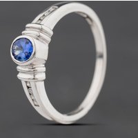 Second Hand 9ct White Gold Tanzanite & 0.08ct Diamond Rubover Dress Ring 41384585