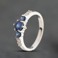 Second Hand 18ct White Gold Tanzanite & 0.14ct Brilliant Cut Diamond Seven Stone Ring 41483089