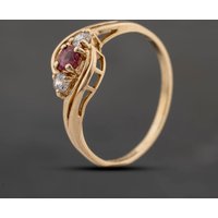 Pre-Owned 9ct Yellow Gold Ruby and Cubic Zirconia Twist Three Stone Ring 41103683