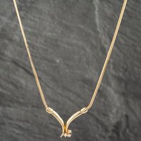 Pre-Owned 9ct Yellow Gold Brilliant Cut Diamond V Shaped Pendant and 17 Inch Curb Chain 41142549