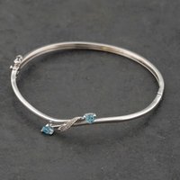 Pre-Owned 9ct White Gold Blue Topaz and Diamond Crossover Hinged Bangle 41211354