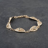 Pre-Owned 9ct Yellow Gold Blue Topaz Celtic Style 7.5 Inch Bracelet 41281328