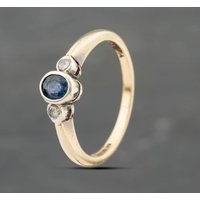 Pre-Owned 9ct Yellow Gold Sapphire and 0.10ct Diamond Rubover Three Stone Ring 41383359