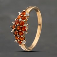 Pre-Owned 9ct Yellow Gold Garnet and 0.10ct Brilliant Cut Diamond Cluster Ring 41383422