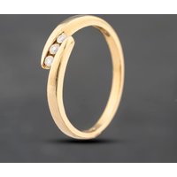Pre-Owned 9ct Yellow Gold 0.10ct Brilliant Cut Diamond Crossover Three Stone Ring 41383516