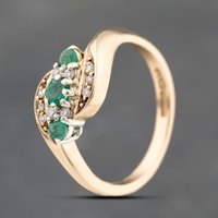 Pre-Owned 9ct Yellow Gold Emerald and 0.10ct Brilliant Cut Diamond Crossover Ring 41383730