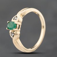 Pre-Owned 9ct Yellow Gold 0.33ct Emerald and 0.01ct Brilliant Cut Diamond Three Stone Ring 41383799