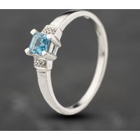 Pre-Owned 9ct White Gold Blue Topaz and 0.04ct Diamond Five Stone Ring 41383894