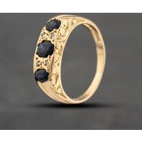 Pre-Owned 18ct Yellow Gold Sapphire and 0.04ct Diamond Seven Stone Ring 41482242