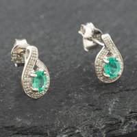Pre-Owned White Gold 0.30ct Oval Cut Emerald and 0.03ct Diamond Swirl Stud Earrings 43171090