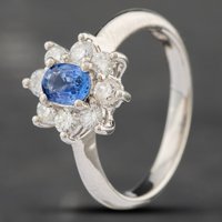 Pre-Owned Platinum 0.56ct Sapphire and 0.56ct Brilliant Cut Diamond Oval Cluster Ring 43351037